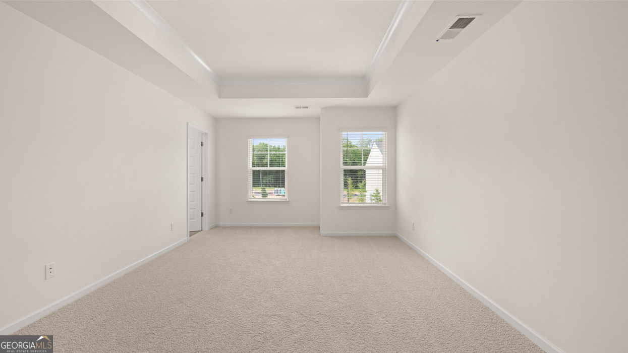 265 Sound Circle Stockbridge, GA 30281 - Photo 10 of 30 an empty room with windows