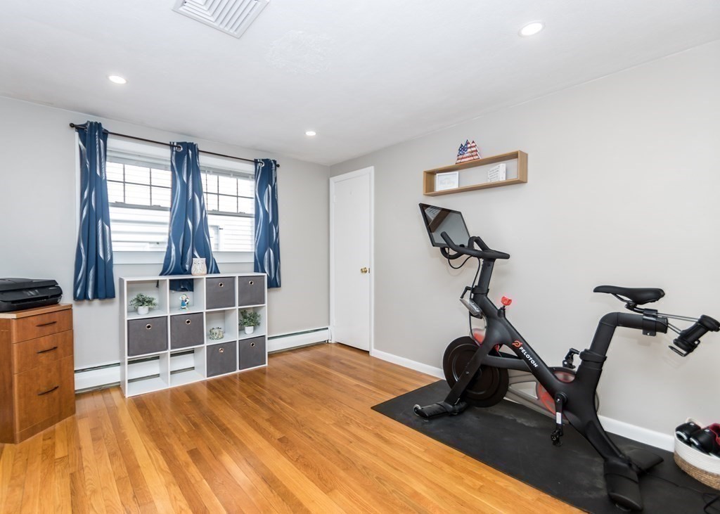 89 Pine Hill Circle Waltham, MA 02451 - Photo 18 of 32 a view of a room with gym equipment