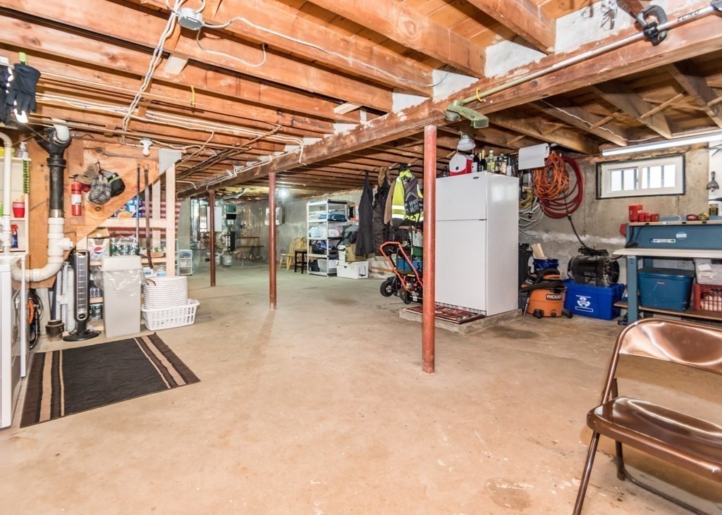 89 Pine Hill Circle Waltham, MA 02451 - Photo 23 of 32 a view of a gym with wooden walls