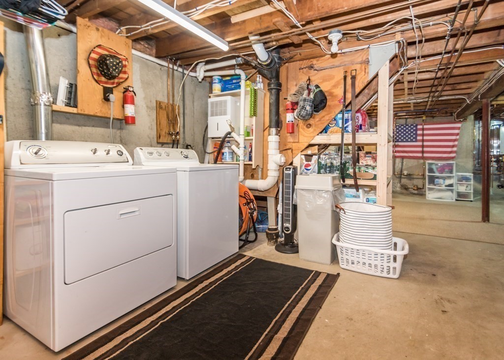89 Pine Hill Circle Waltham, MA 02451 - Photo 24 of 32 a utility room with dryer and washer