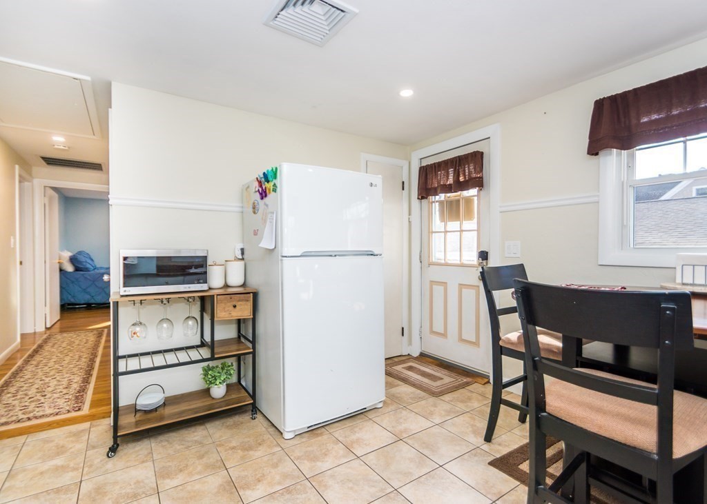 89 Pine Hill Circle Waltham, MA 02451 - Photo 6 of 32 a view of kitchen with furniture and window