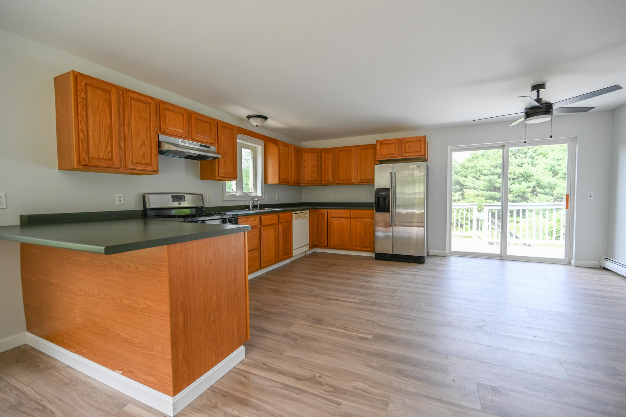 6 Garlands Way Limington, ME 04049 - Photo 11 of 46 Open kitchen, dining, living space