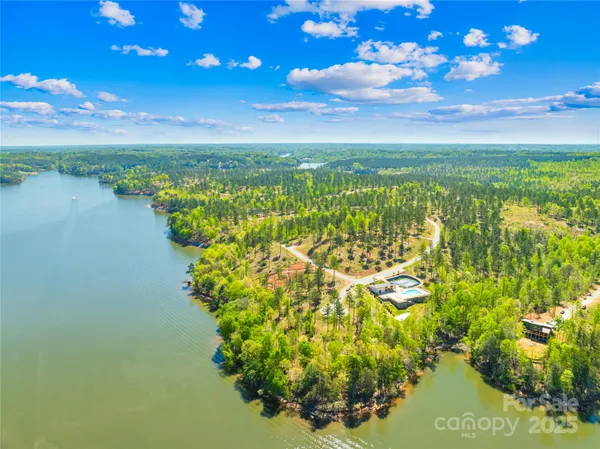 a view of lake with green space