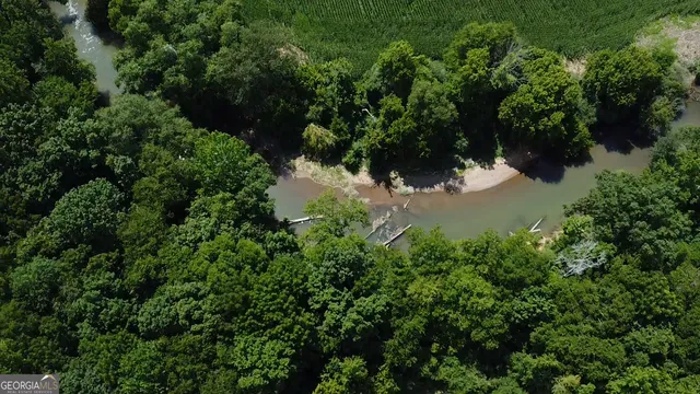a view of a lake with a yard