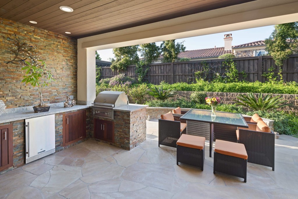 698 Normandy Road Encinitas, CA 92024 - Photo 14 of 35 a outdoor living space with furniture and garden view