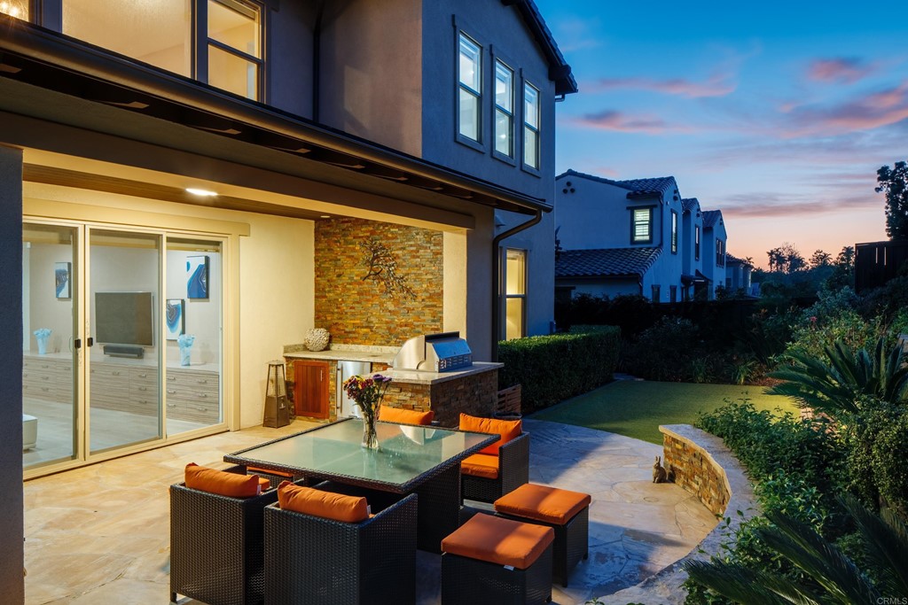 698 Normandy Road Encinitas, CA 92024 - Photo 33 of 35 a backyard of a house with outdoor seating
