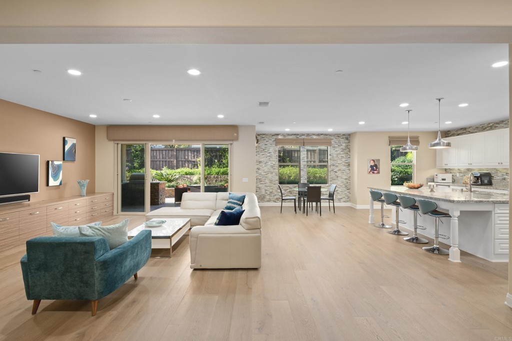 698 Normandy Road Encinitas, CA 92024 - Photo 6 of 35 a living room with furniture and a large window
