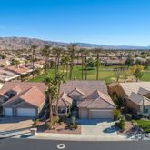 an aerial view of a house with a garden