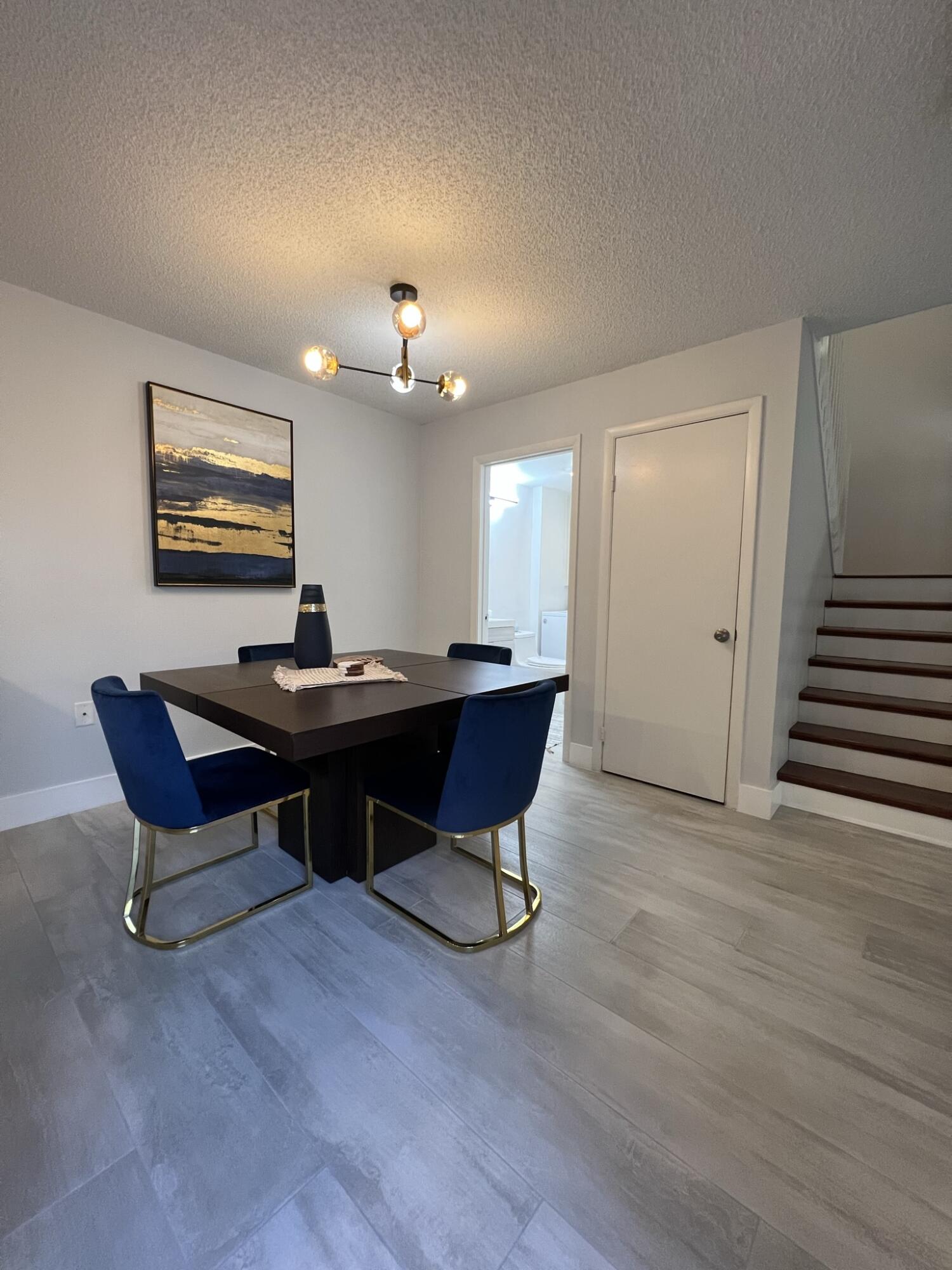 802 Blue Ridge Circle West Palm Beach, FL 33409 - Photo 14 of 37 a view of a workspace with furniture and wooden floor
