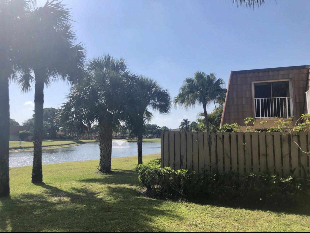 802 Blue Ridge Circle West Palm Beach, FL 33409 - Photo 2 of 37 a view of backyard with green space