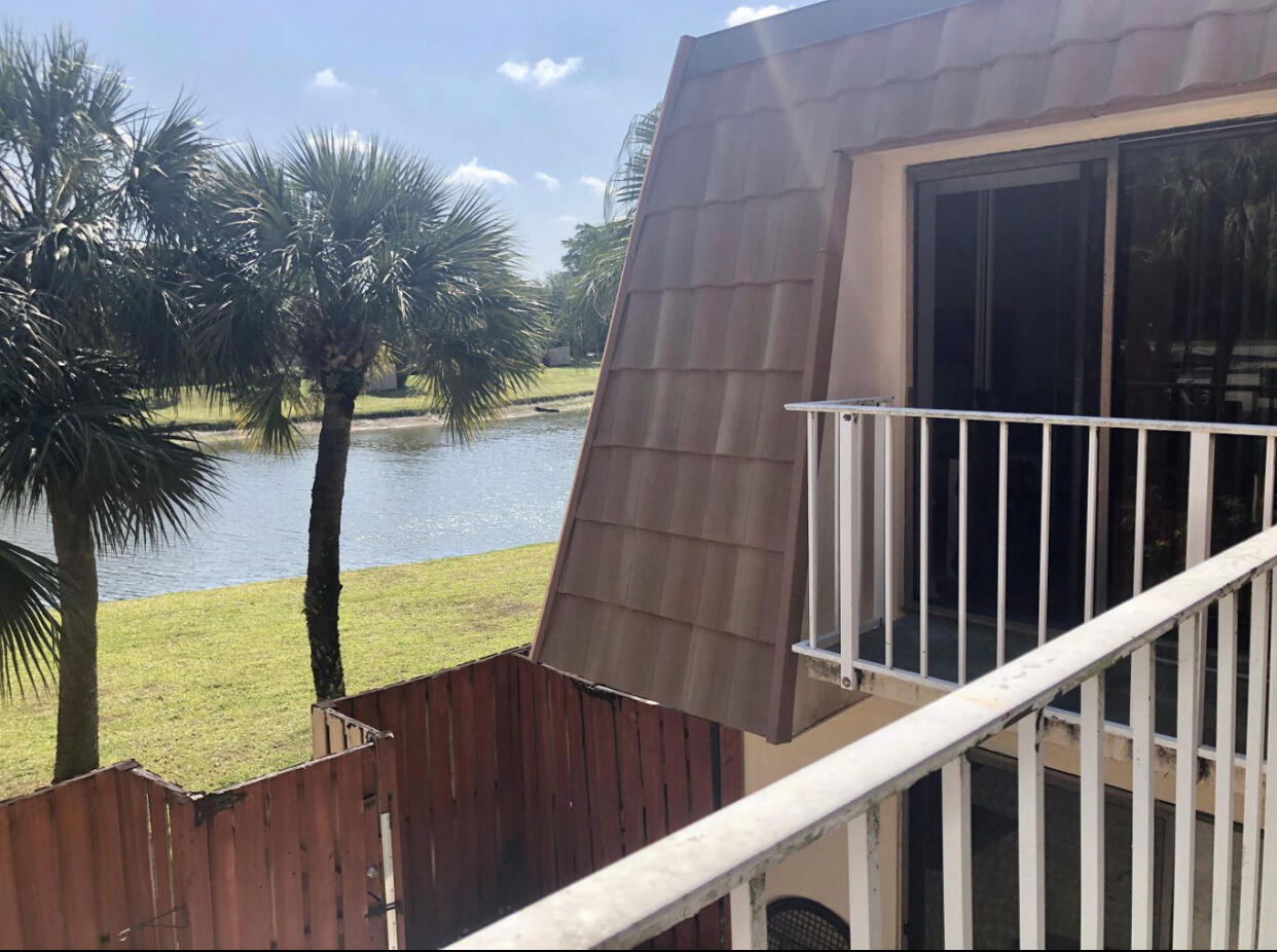 802 Blue Ridge Circle West Palm Beach, FL 33409 - Photo 25 of 37 a view of swimming pool from a balcony
