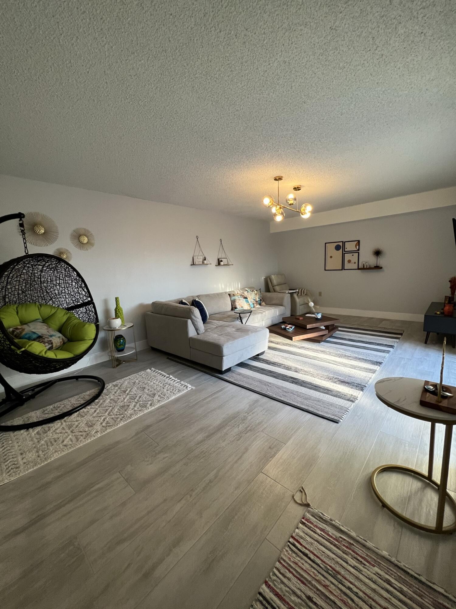 802 Blue Ridge Circle West Palm Beach, FL 33409 - Photo 10 of 37 a room with gym equipment and a mirror