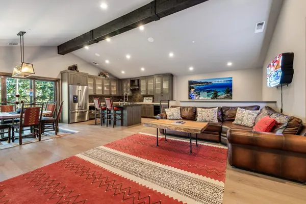 a living room with furniture and a table