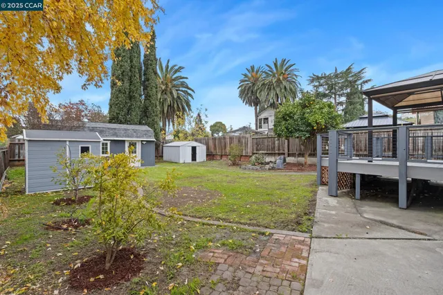 a view of house with outdoor space and seating area