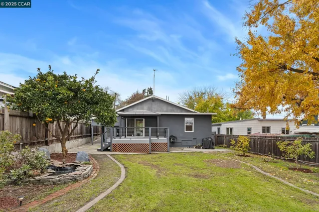 a front view of a house with swimming pool