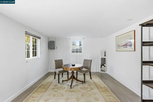 a workspace with furniture and window