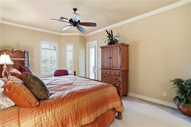 a bed room with a bed and a dresser