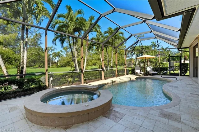 a view of swimming pool with a patio