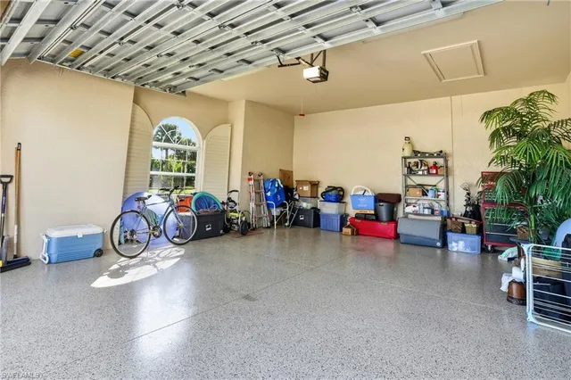 an aerial view of multiple houses with yard