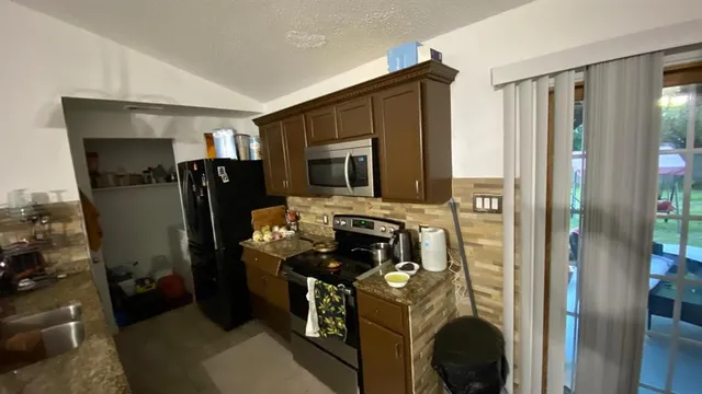 a view of storage and utility room