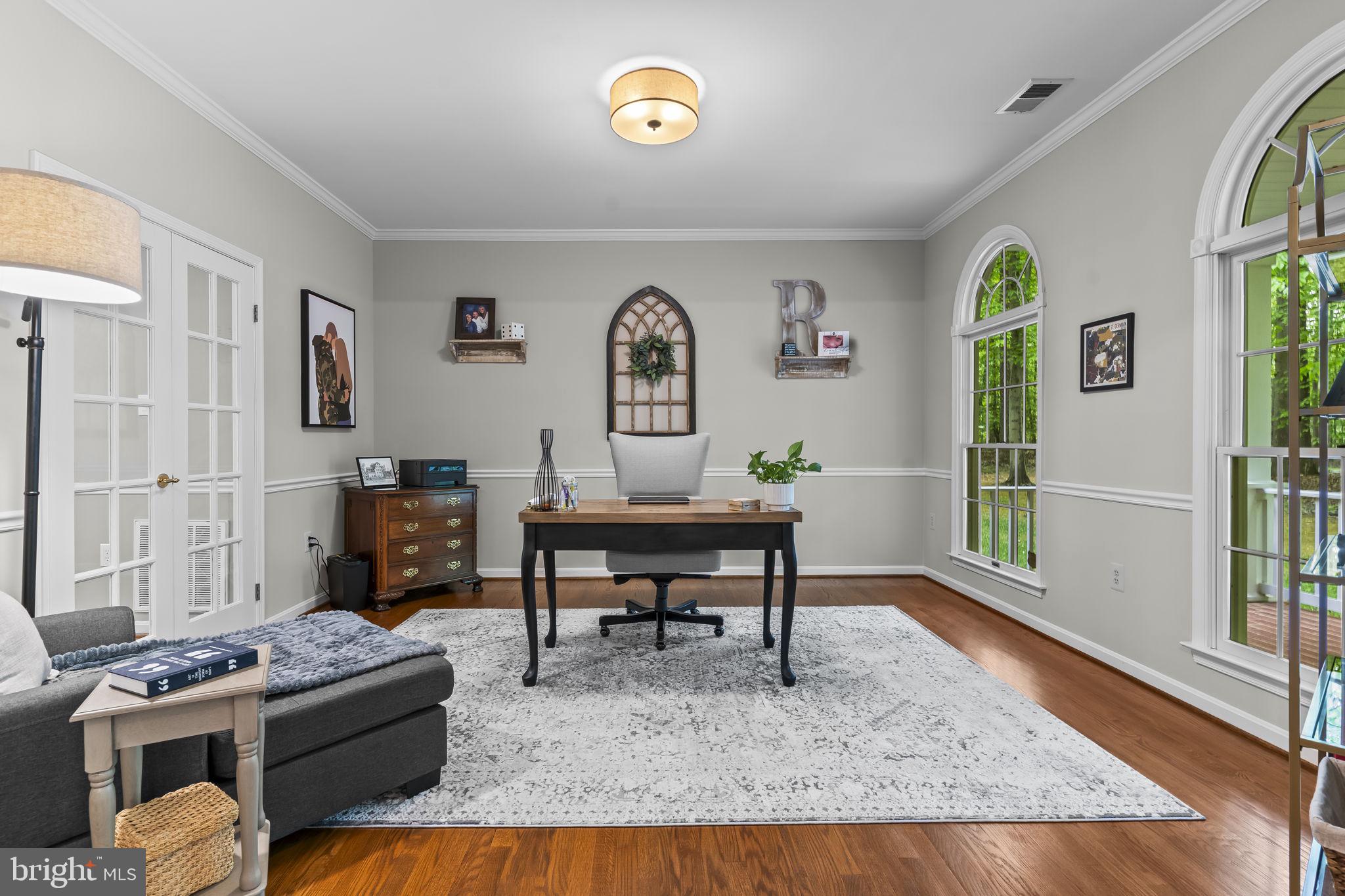 4111 Buck Board Lane Dunkirk, MD 20754 - Photo 16 of 74 a living room with furniture and a wooden floor
