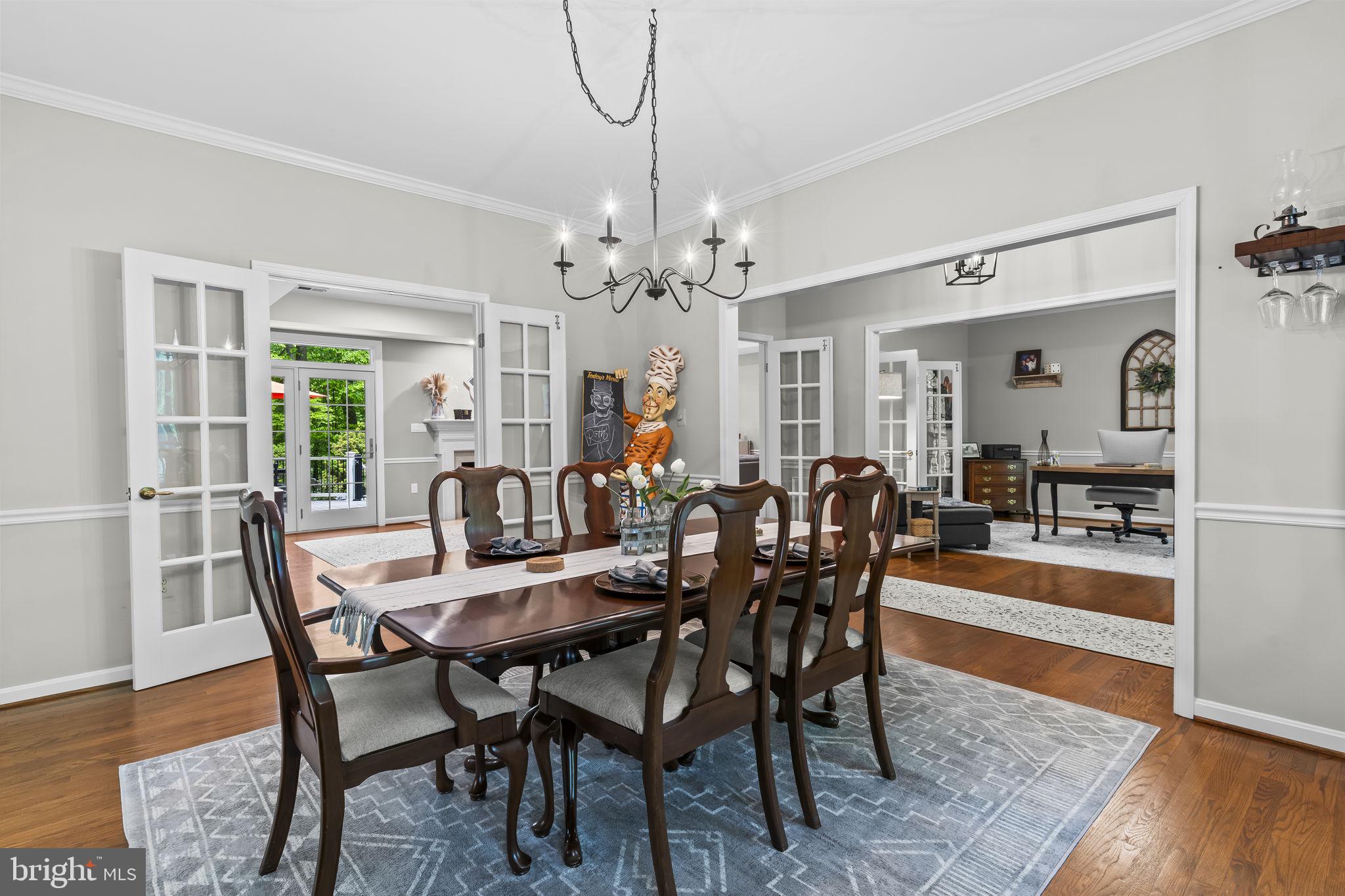 4111 Buck Board Lane Dunkirk, MD 20754 - Photo 17 of 74 a view of a dining room with furniture and wooden floor