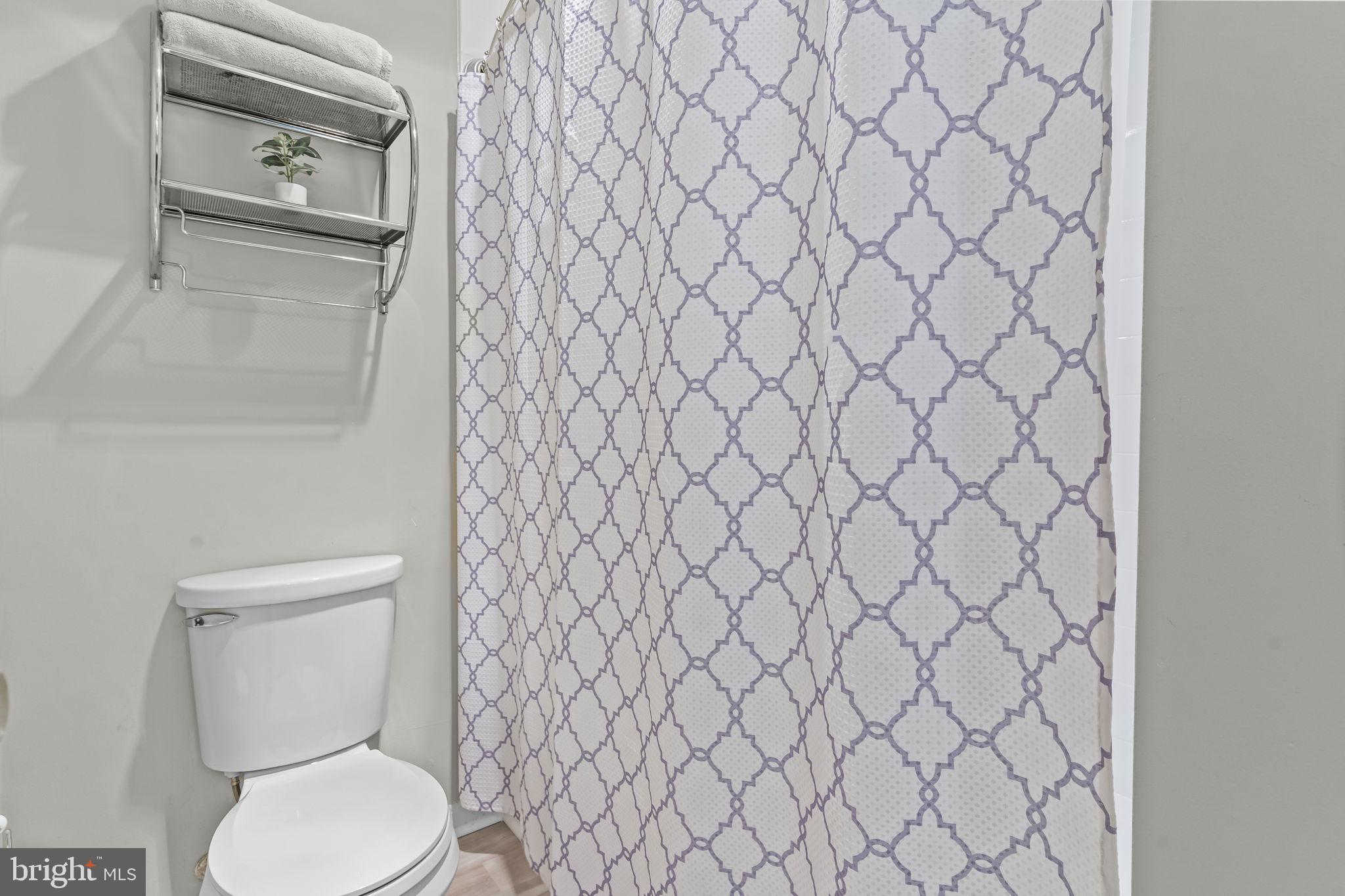4111 Buck Board Lane Dunkirk, MD 20754 - Photo 38 of 74 a white toilet sitting next to a white wall