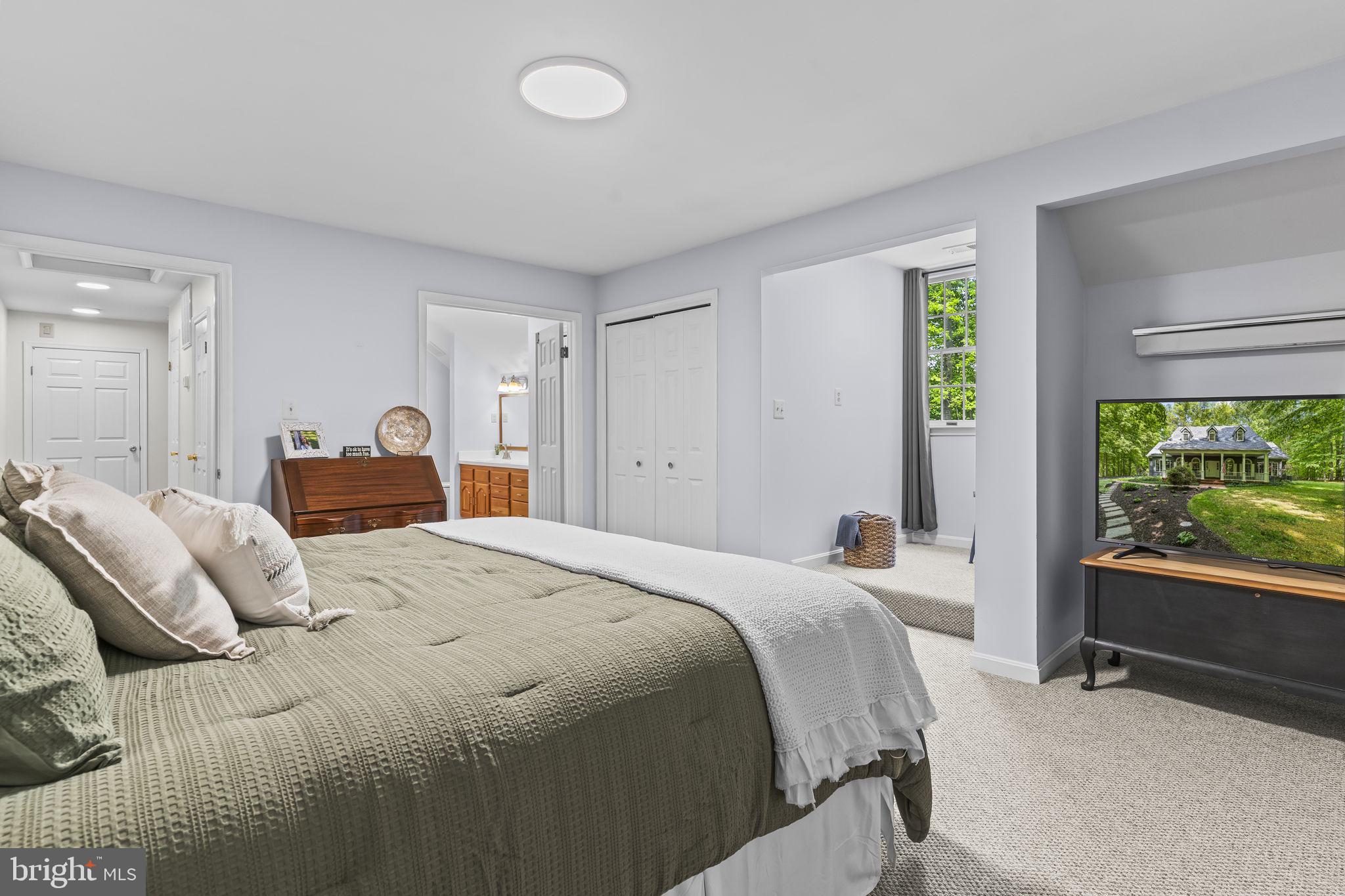 4111 Buck Board Lane Dunkirk, MD 20754 - Photo 41 of 74 a bedroom with a bed and a large window