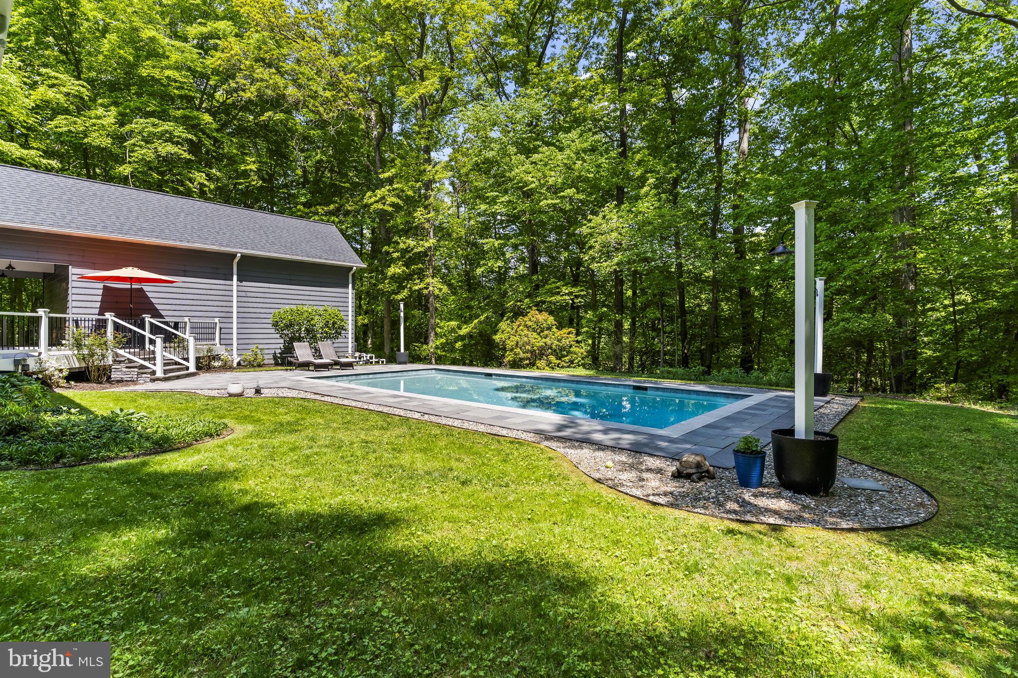 4111 Buck Board Lane Dunkirk, MD 20754 - Photo 55 of 74 a view of a swimming pool with sitting area