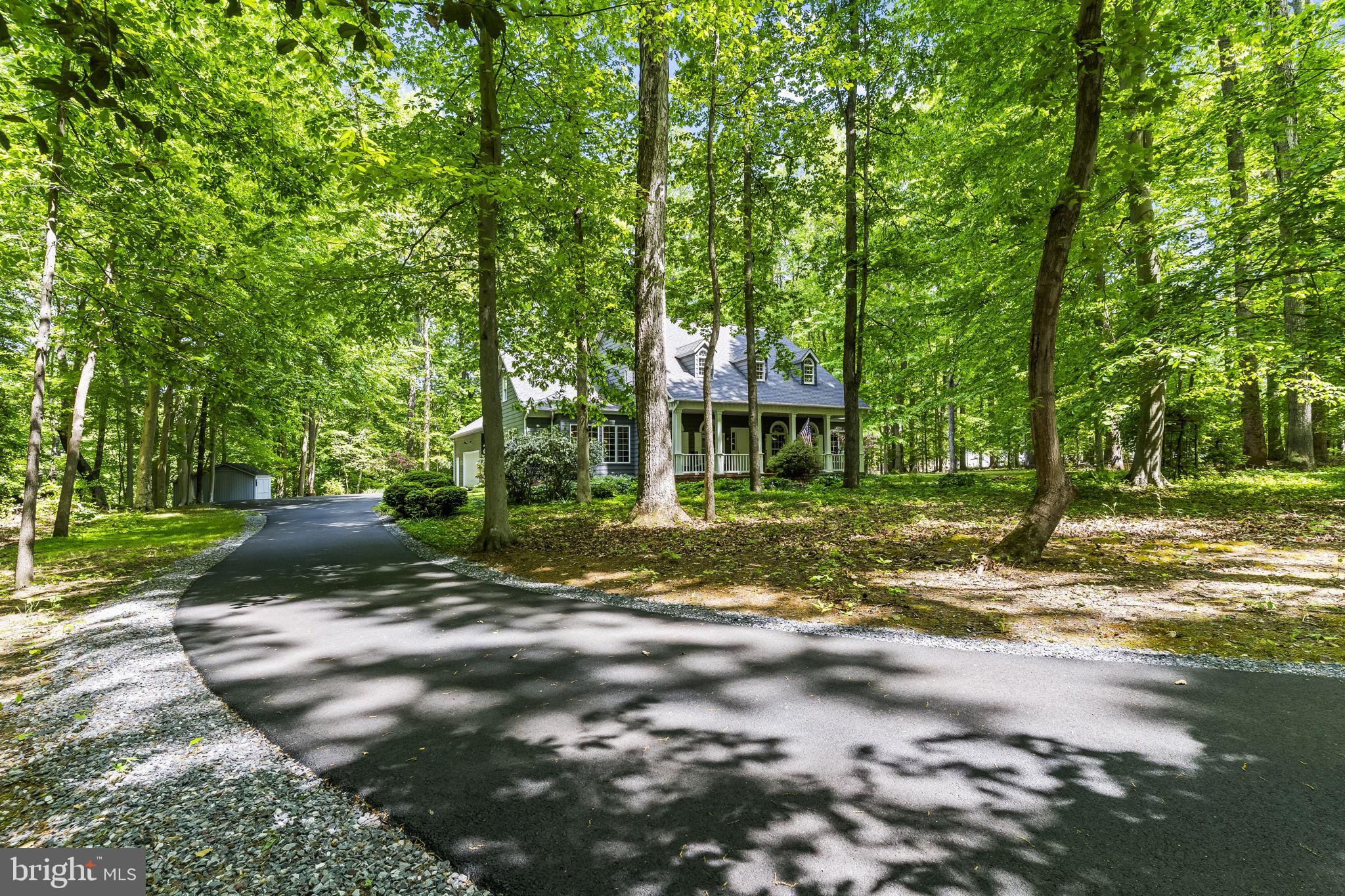 4111 Buck Board Lane Dunkirk, MD 20754 - Photo 61 of 74 a view of a house with backyard and trees