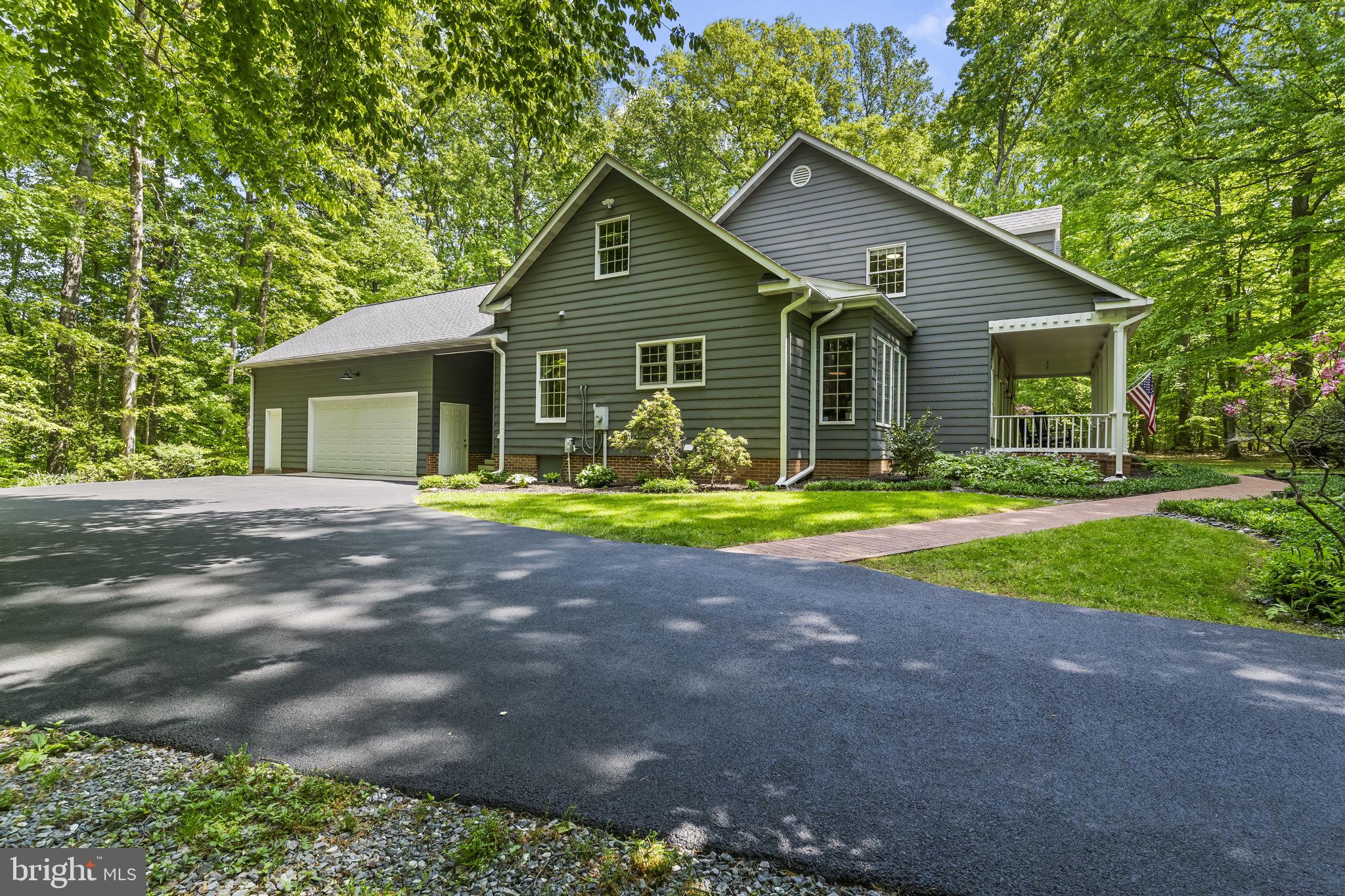 4111 Buck Board Lane Dunkirk, MD 20754 - Photo 10 of 74 a view of a house with backyard and yard