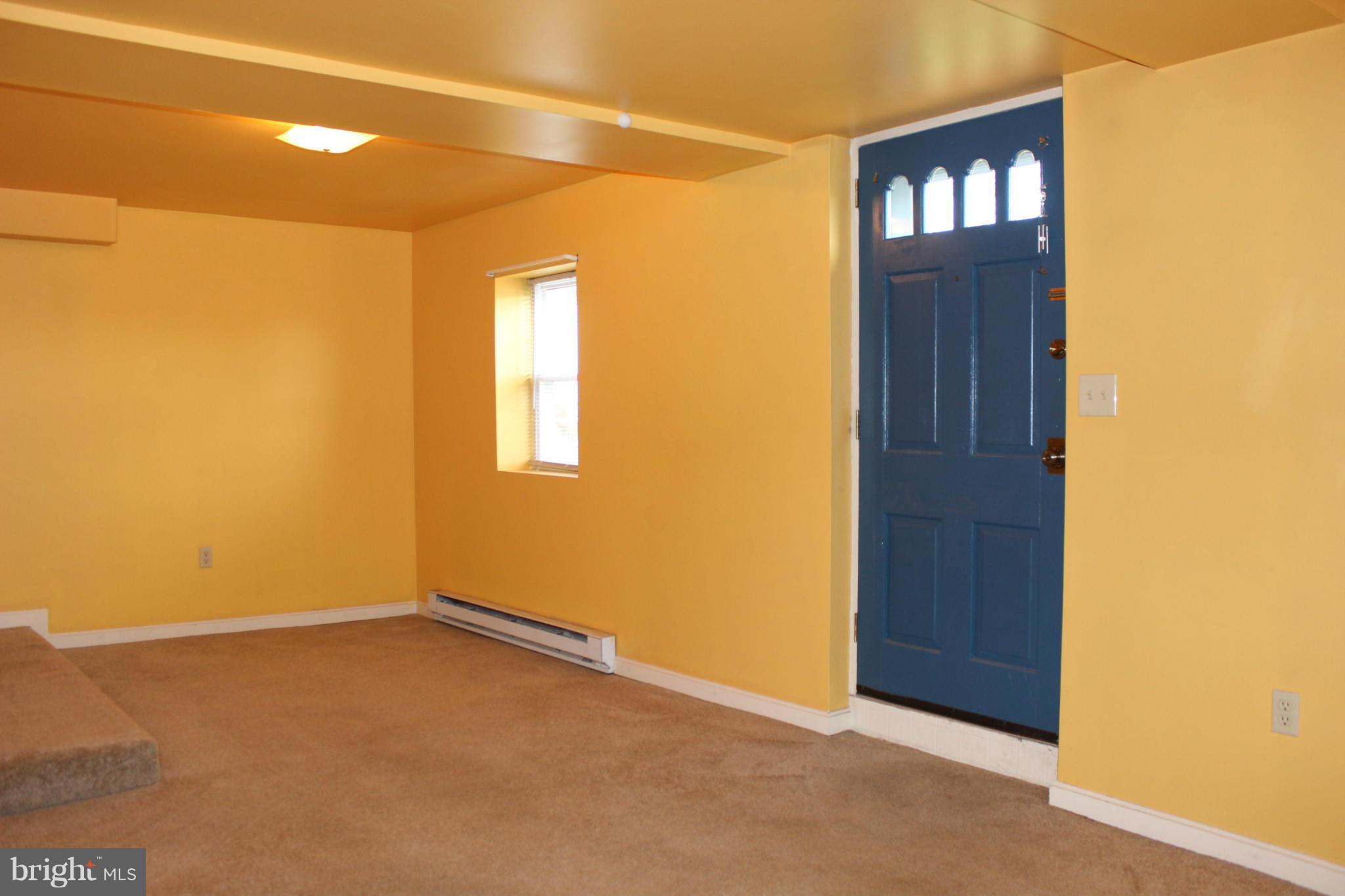 100 North Reymann Street Ranson, WV 25438 - Photo 14 of 16 Family Room in Basement Apt