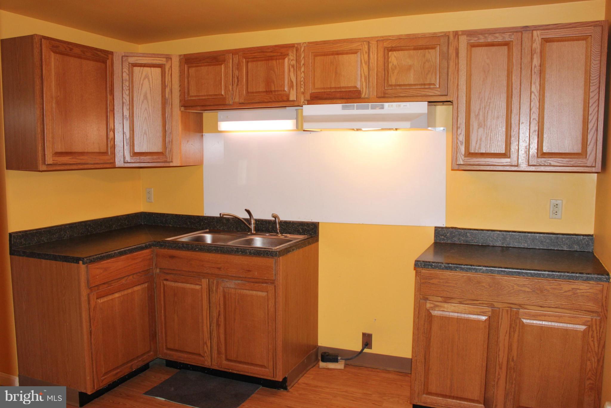 100 North Reymann Street Ranson, WV 25438 - Photo 15 of 16 Kitchen in Basement Apt