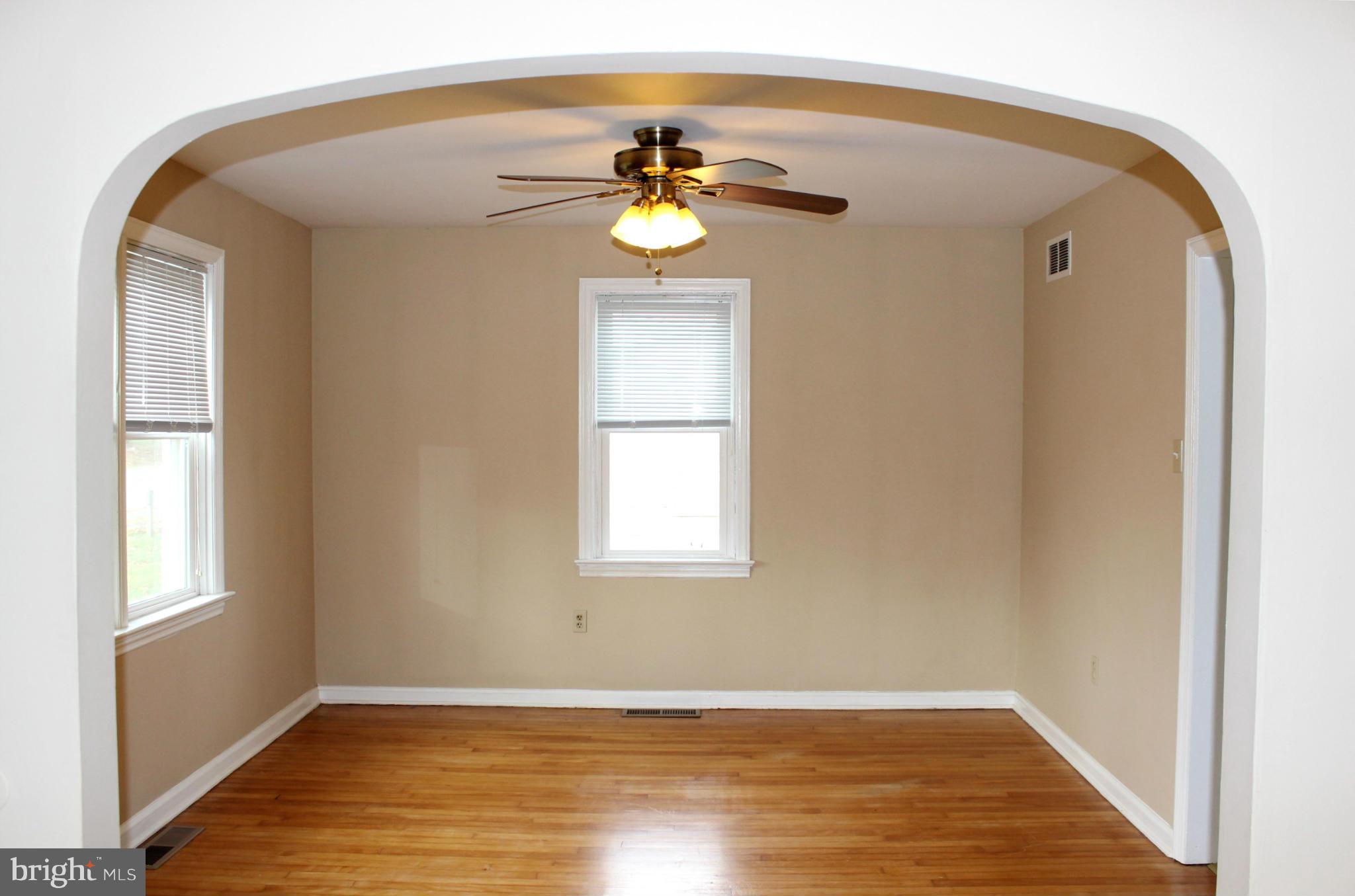 100 North Reymann Street Ranson, WV 25438 - Photo 8 of 16 Dining Room with Hardwood Floor