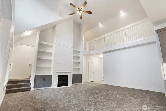 wooden floor in an empty room with a fireplace