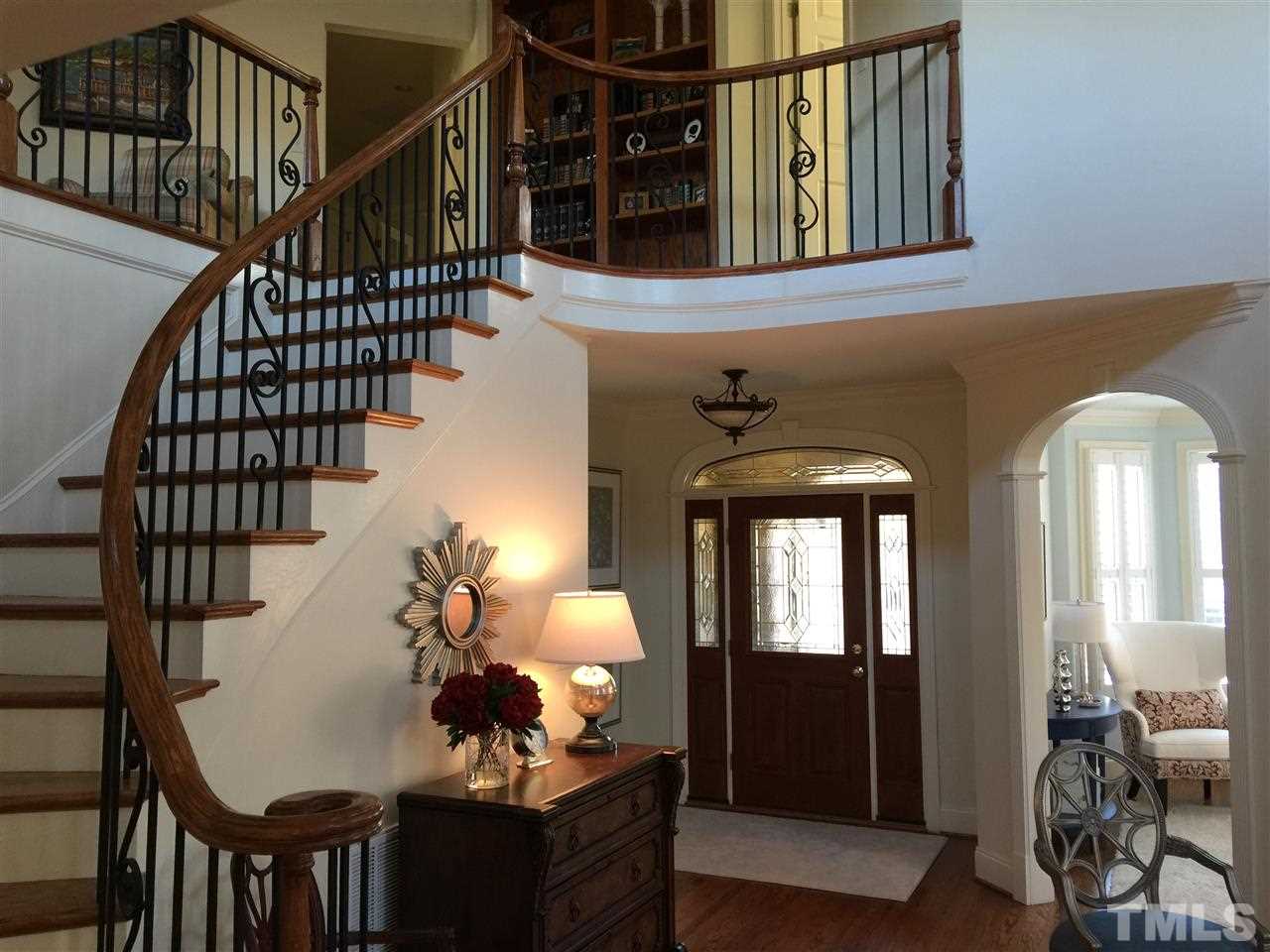 1832 Torrington Street Raleigh, NC 27615 - Photo 5 of 6 a view of entryway and hall with wooden floor