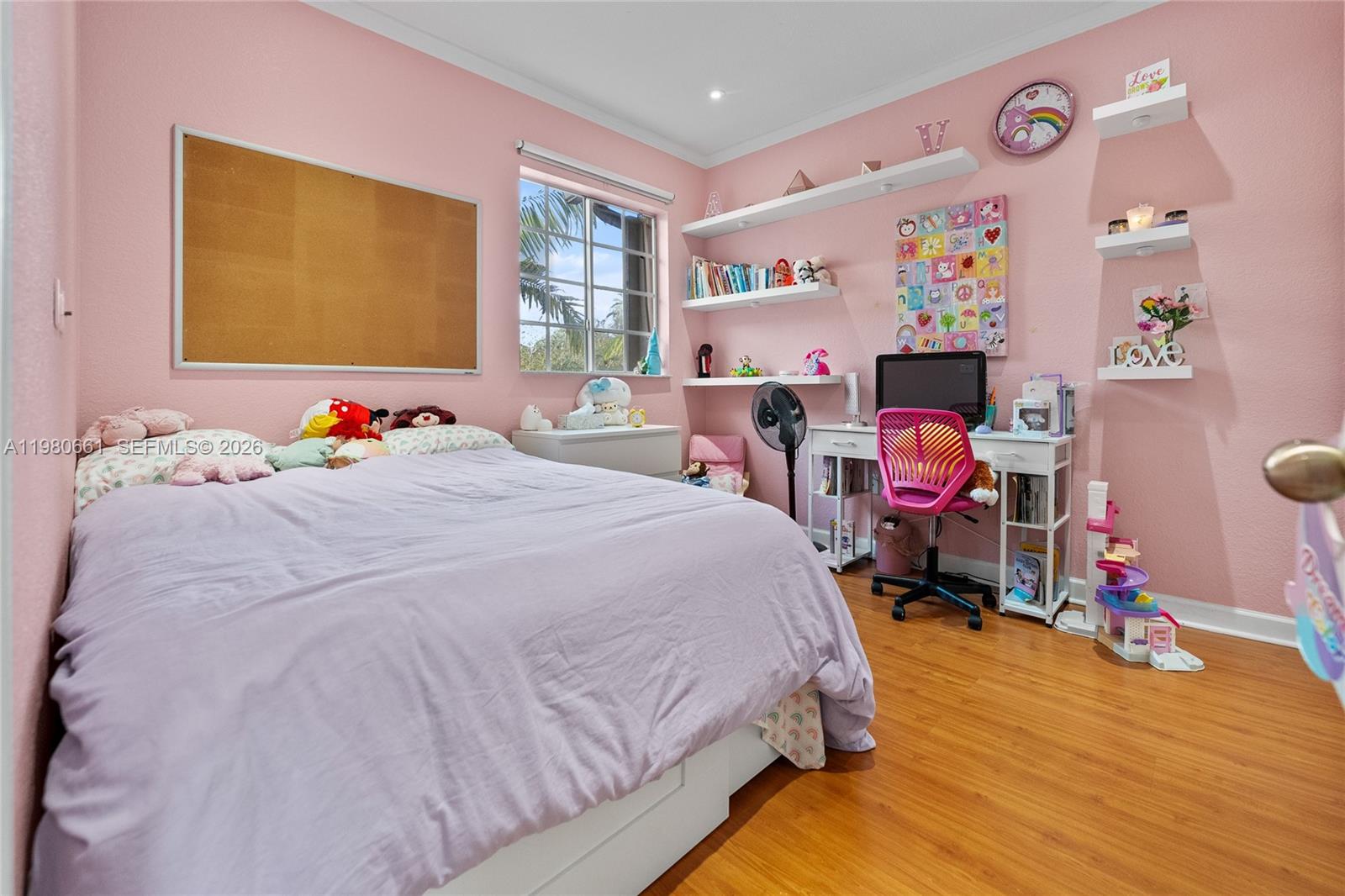 21474 Southwest 85th Path Cutler Bay, FL 33189 - Photo 21 of 30 a bedroom with bed and a window