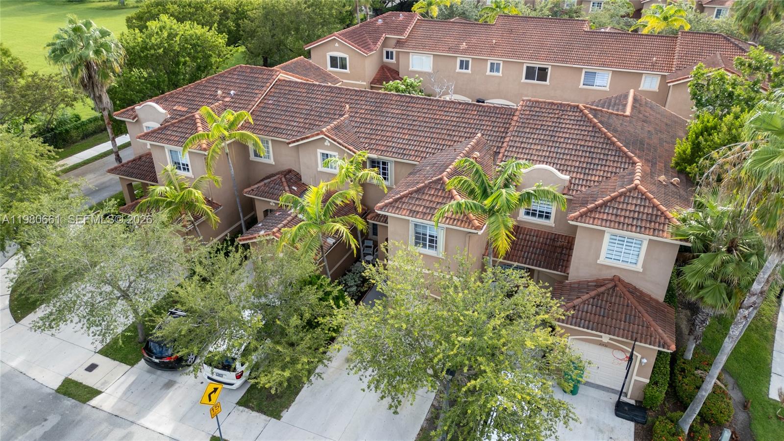 21474 Southwest 85th Path Cutler Bay, FL 33189 - Photo 30 of 30 an aerial view of a house with a yard