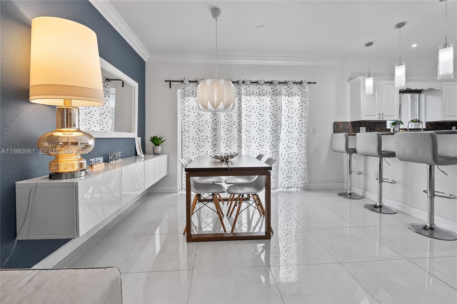 21474 Southwest 85th Path Cutler Bay, FL 33189 - Photo 8 of 30 a view of kitchen with furniture and window