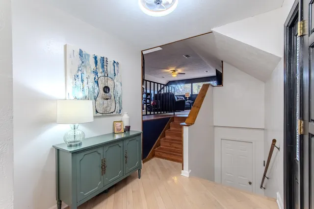a view of a kitchen cabinets and a wooden floor