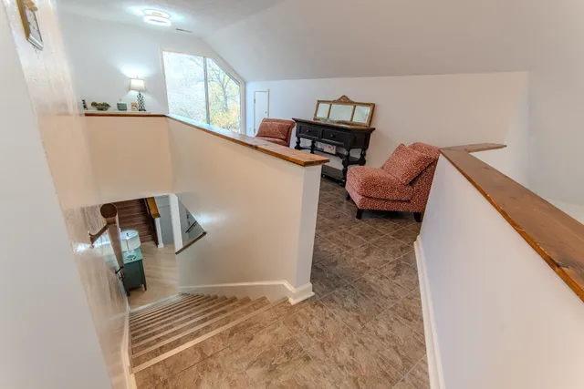 a room with furniture and a window