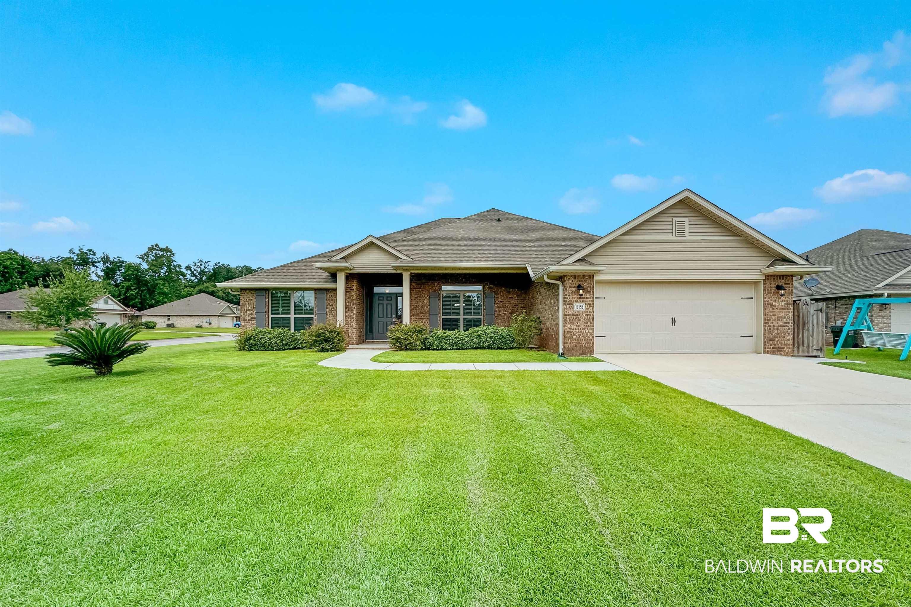 13155 Wishbone Court Foley, AL 36535 - Photo 3 of 39 View of front of property featuring a garage and a front yard