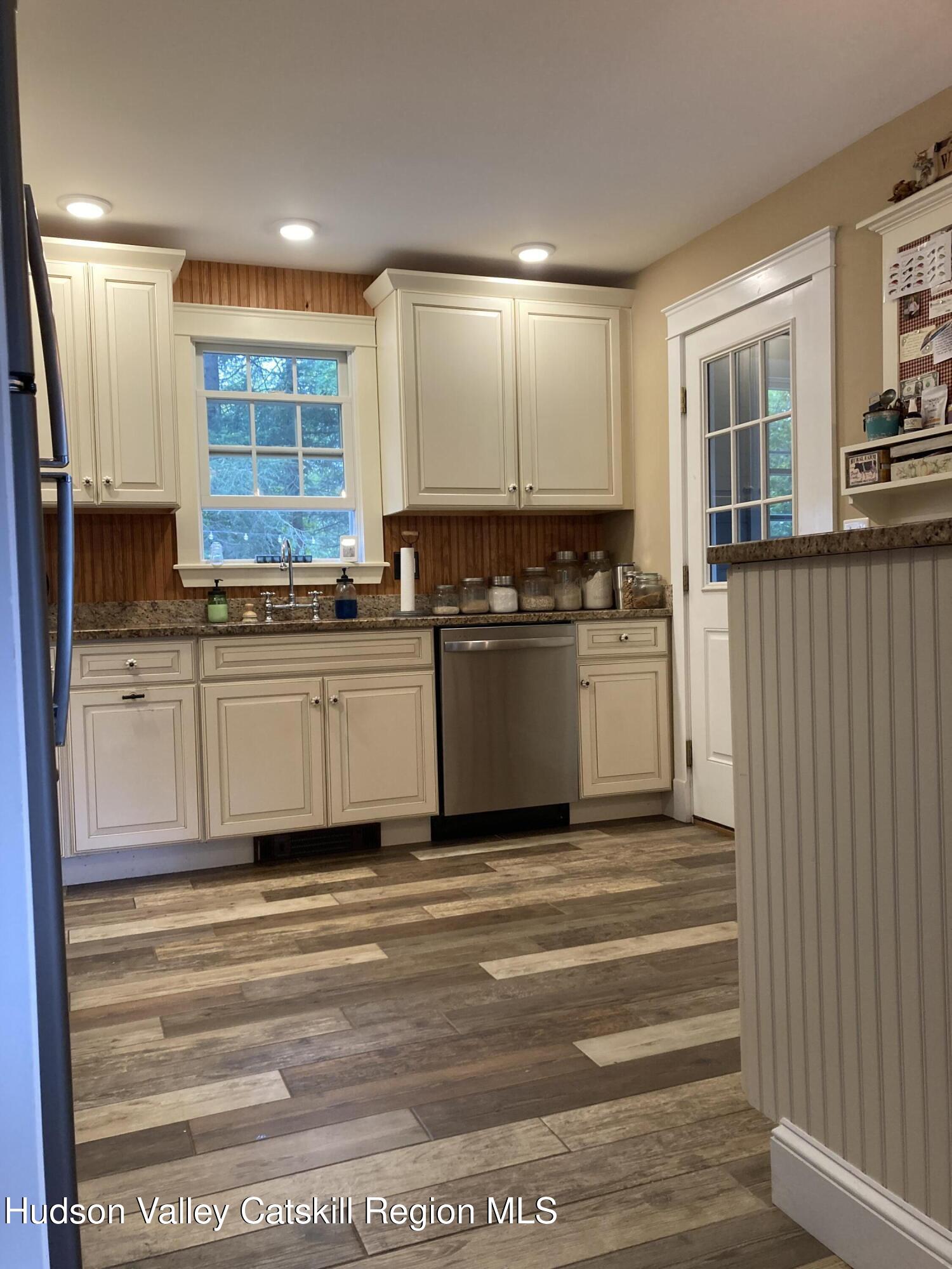 14 Knoth Road Wallkill, NY 12589 - Photo 18 of 46 a kitchen with stainless steel appliances granite countertop a stove a sink and a refrigerator