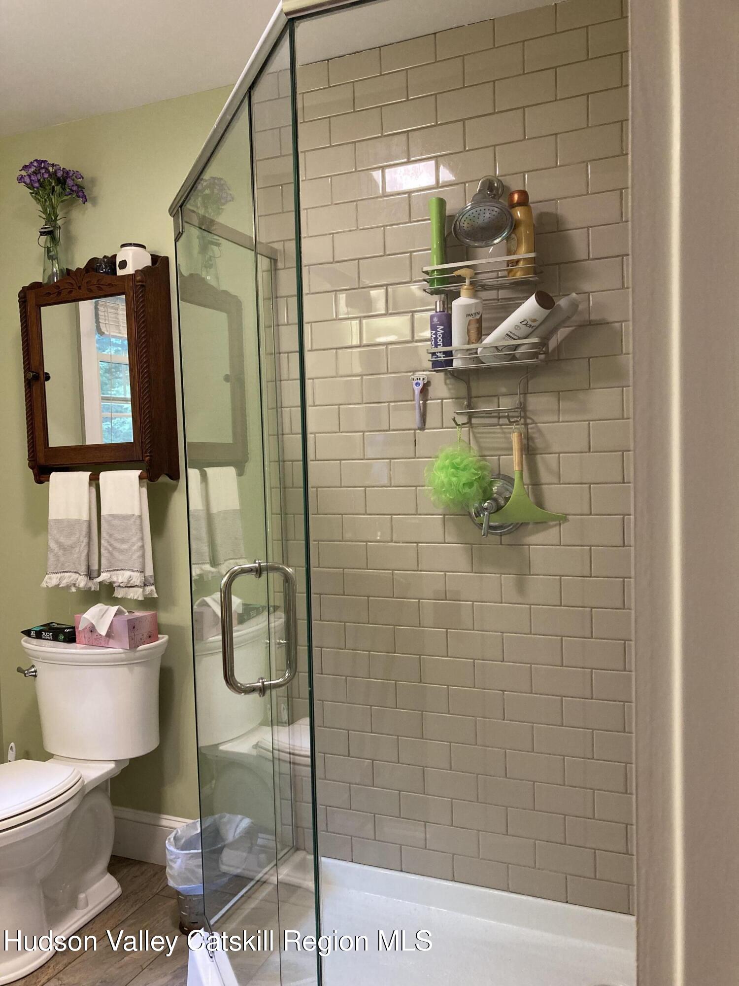 14 Knoth Road Wallkill, NY 12589 - Photo 20 of 46 a bathroom with a shower toilet and sink