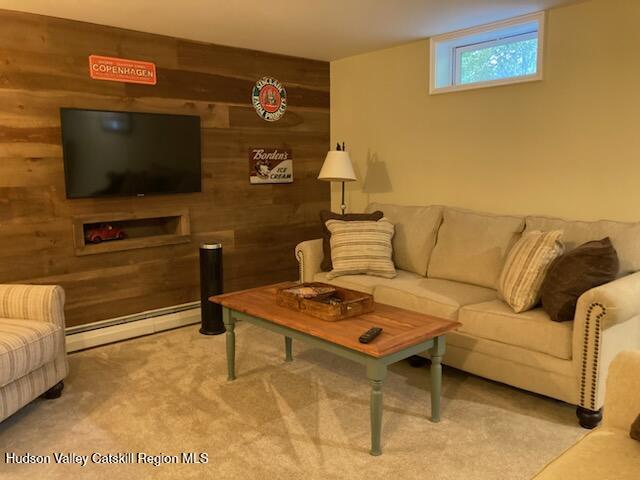 14 Knoth Road Wallkill, NY 12589 - Photo 31 of 46 a living room with furniture and a flat screen tv