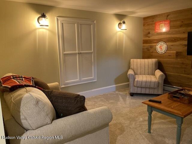 14 Knoth Road Wallkill, NY 12589 - Photo 32 of 46 a living room with furniture and a mirror