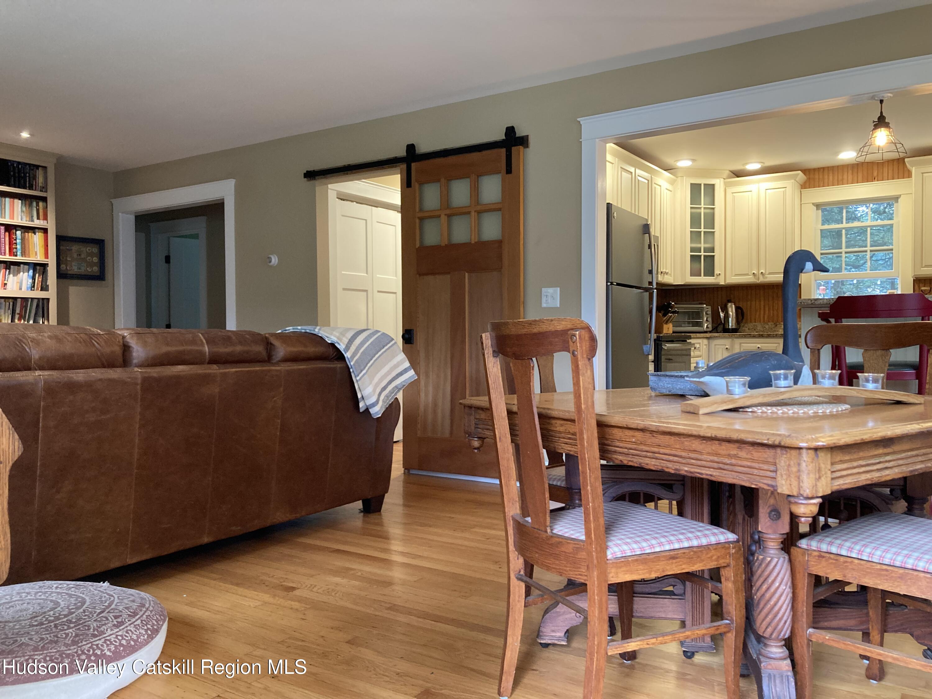 14 Knoth Road Wallkill, NY 12589 - Photo 7 of 46 a living room with furniture and a wooden floor