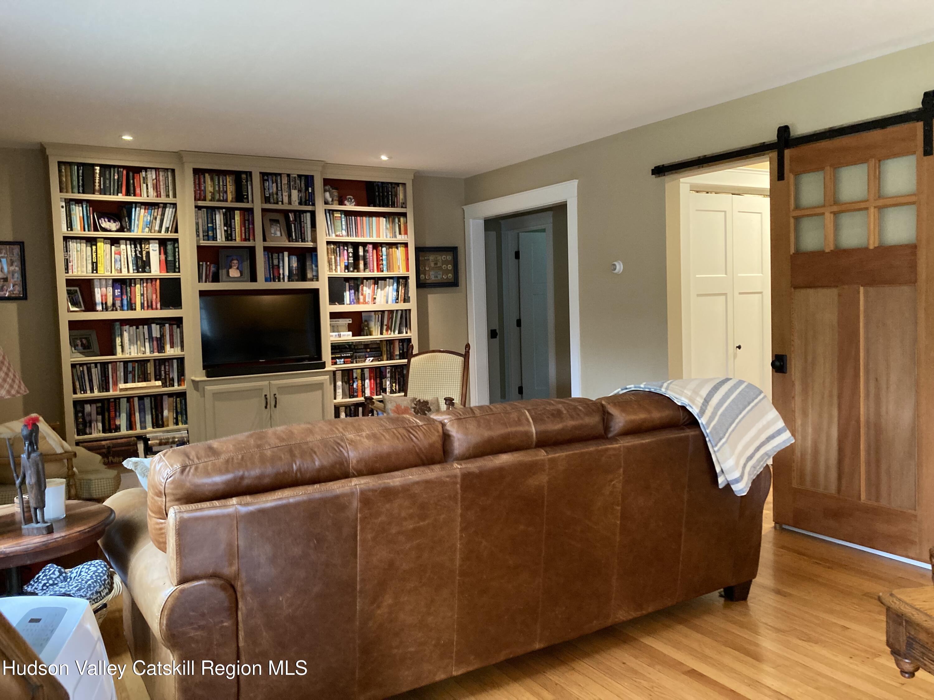 14 Knoth Road Wallkill, NY 12589 - Photo 8 of 46 a living room with furniture and a flat screen tv