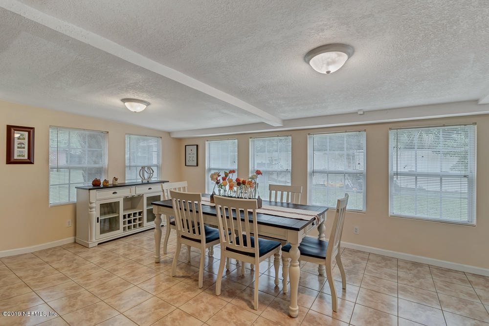 6026 Temple Road Jacksonville, FL 32217 - Photo 12 of 13 a view of a dining room with furniture