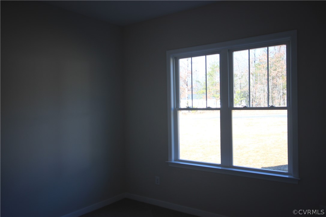 209 New S Ridge Road Bumpass, VA 23024 - Photo 16 of 26 a view of an empty room with a window